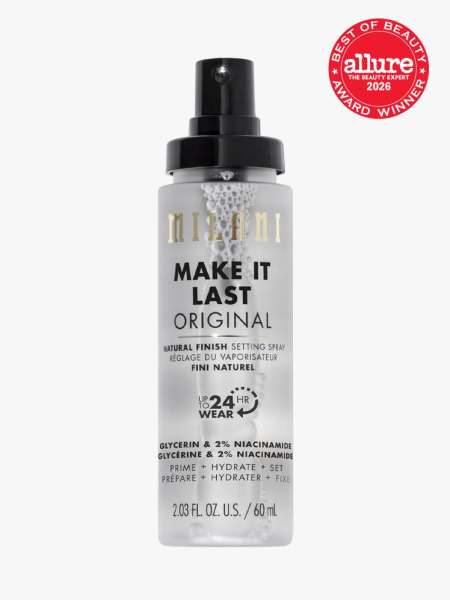 Clear spray bottle of Milani Cosmetics Make it Last Original—Natural Finish Setting Spray with black cap and an Allure Best of Beauty stamp in the top right corner on a light gray background