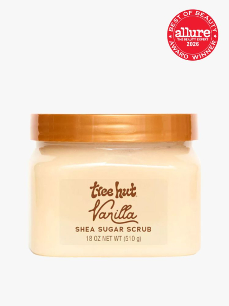 Tree Hut Shea Sugar Scrub pale yellow jar with orange lid on a gray background with Allure Best of Beauty seal in the top right corner