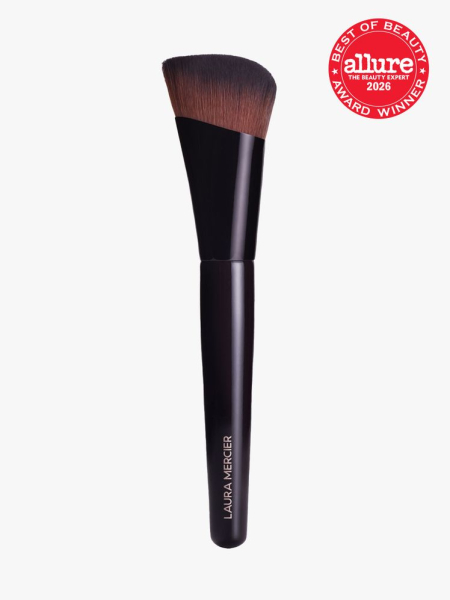 Laura Mercier Real Flawless Foundation Brush in branded component on a light gray background with the 2026 best of beauty seal in the top right corner