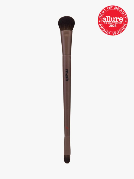 M.ph Underpainting Dual-Ended Sculpting Brush in branded component on a light gray background with the 2026 best of beauty seal in the top right corner